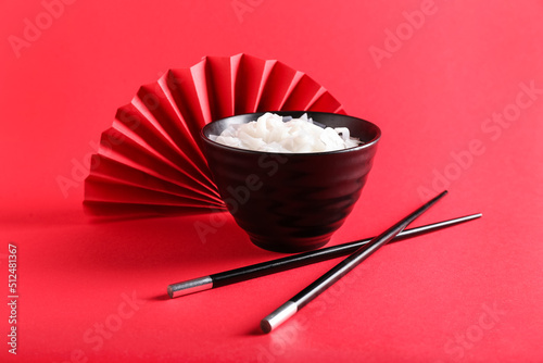 Bowl with tasty noodles and...