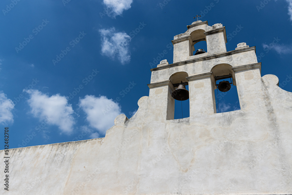 Bell Tower and White Walls at Mission San Juan , San Antonio, Texas, USA