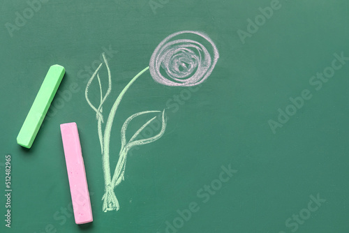 Drawn flower with chalks on...