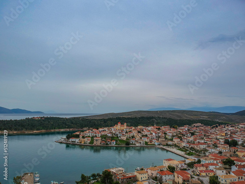 Aerial panoramic view from the picturesque fishing village of Galaxidi or Galaxeidi. It is a famous coastal village and a former municipality in the southern part of Phocis, Greece, Europe © panosk18