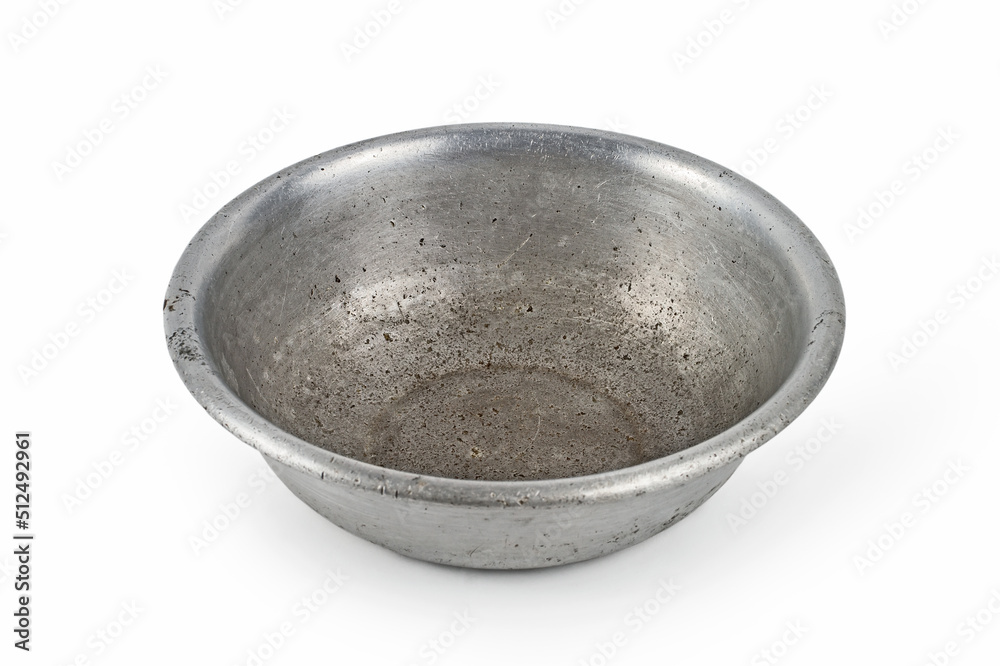 Antique aluminum plate on a white background. Antique aluminum plate on a white background.