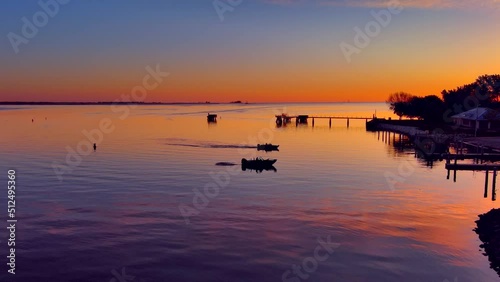 Wallpaper Mural Fishing boats going out at sunrise, in summer, scenic aerial view.
 Torontodigital.ca