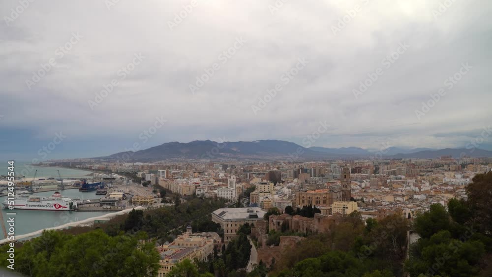 Stunning daytime panorama in Malaga, Spain on cloudy day Stunning daytime panorama in Malaga, Spain on cloudy day