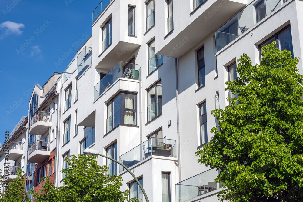 Modern white apartment building seen in Berlin, Germany Modern white apartment building seen in Berlin, Germany