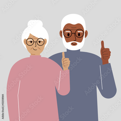 Smiling elderly couple, good mood concept. Positive emotions, happy people, boyfriend and girlfriend showing thumbs up, fun and joy.