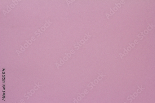 Fototapeta Naklejka Na Ścianę i Meble -  Pink paper background.The texture of thick pink paper for creativity.Space for copying.