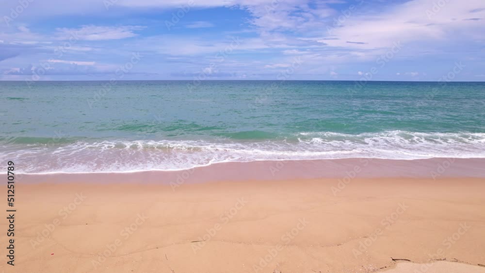 Top view of Beautiful tropical sea sandy beach and waves crashing against sand beach from above Beautiful sea surface at Phuket beach is famous tourist destination Top view of Beautiful tropical sea sandy beach and waves crashing against sand beach from above Beautiful sea surface at Phuket beach is famous tourist destination