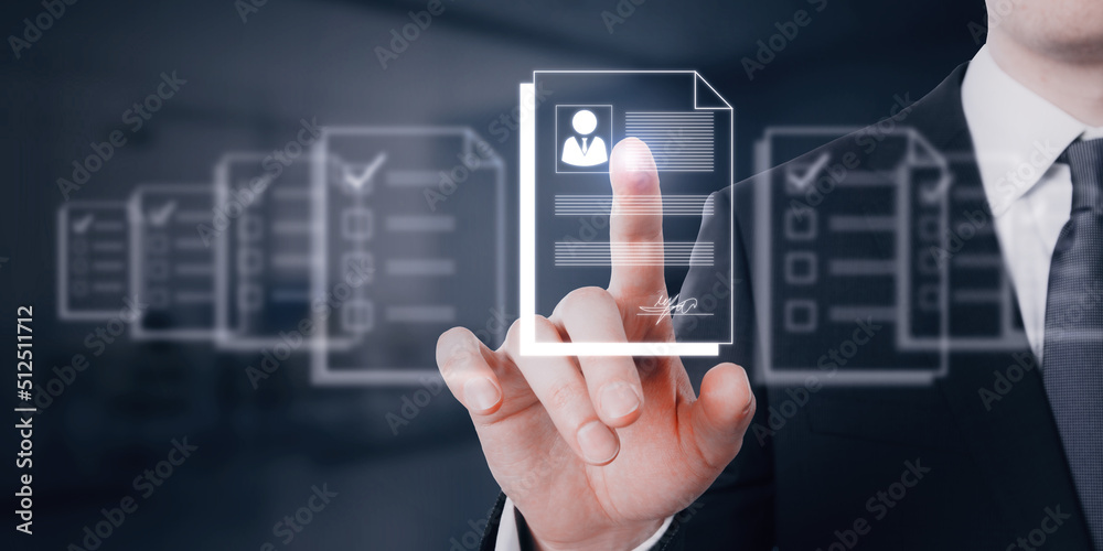 Human resource information system and talent marketplace concept with HR manager scrolling digital resume on virtual screen Human resource information system and talent marketplace concept with HR manager scrolling digital resume on virtual screen