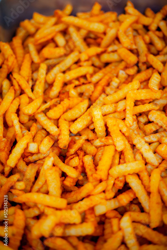 French fries in a plate. Fried Potatoes with Paprika.