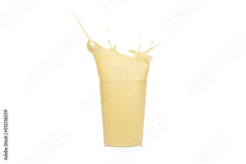 Close up of a glass of splashing banana juice