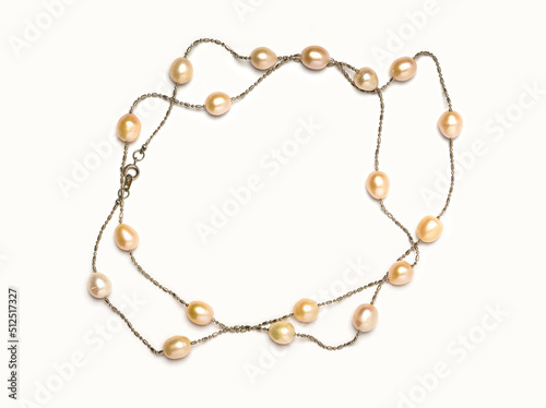 Drop shape freshwater pearl necklace on white background. Collection of luxury jewelry accessories. Studio shot