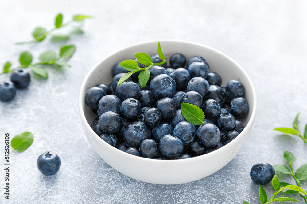 Blueberry with leaves in a bowl Blueberry with leaves in a bowl