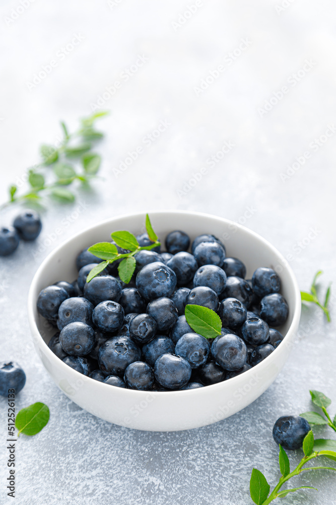 Blueberry with leaves in a bowl Blueberry with leaves in a bowl
