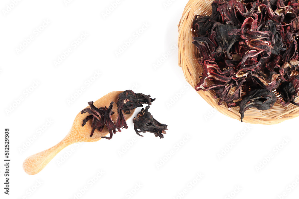 Close up of Dried hibiscus sabdariffa or roselle fruits in n wooden spoon on white background. Herbal tea Close up of Dried hibiscus sabdariffa or roselle fruits in n wooden spoon on white background. Herbal tea