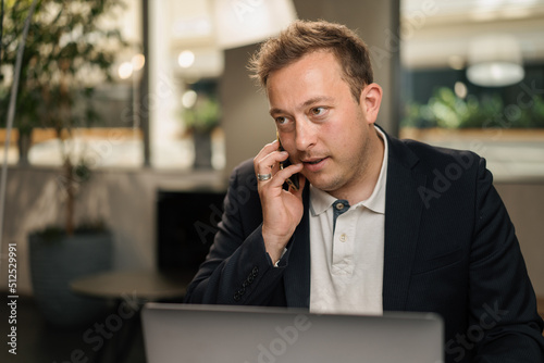 Young attractive businessman lawyer in a suit on zoom call. Video conference, call, profile picture, handsome businessman portrait, professional profession, person concept