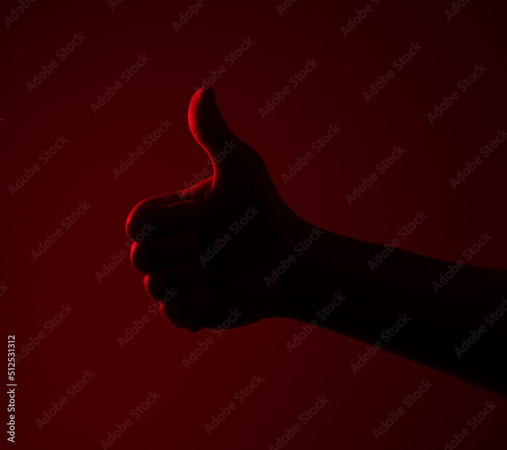 thumbs up sign. Gesture. Man hand. Finger. Background. 