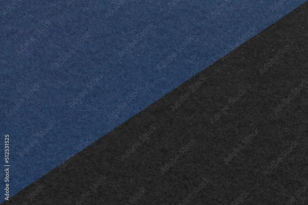 Texture of craft navy blue and black paper background, half two colors, macro. Structure of vintage kraft cardboard. Texture of craft navy blue and black paper background, half two colors, macro. Structure of vintage kraft cardboard.