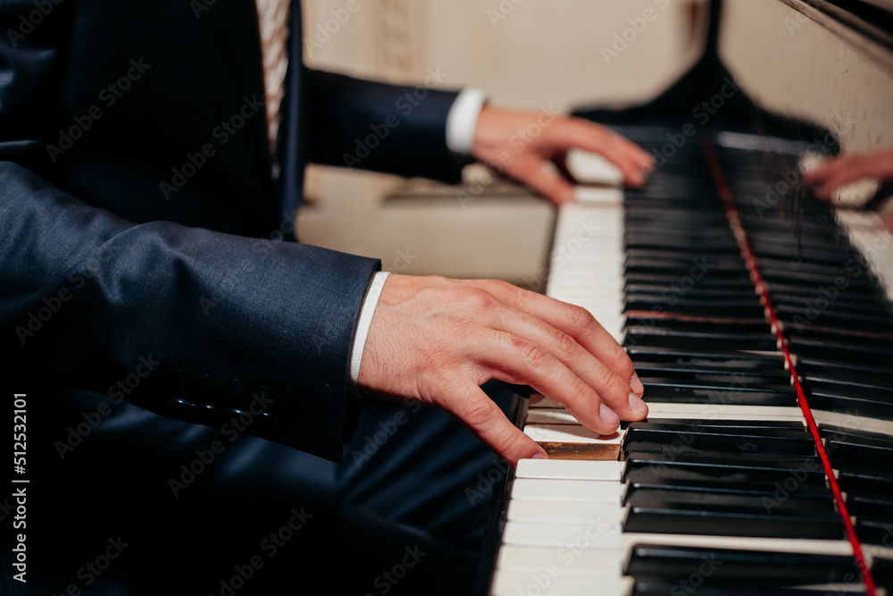 Fototapeta premium hands playing piano