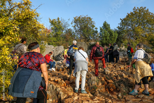 Pilgrims on the hill of apparitions, Podbrdo, Medjugorje, Bosnia and Herzegovina