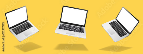 Flying laptop mock up with blank screen isolated