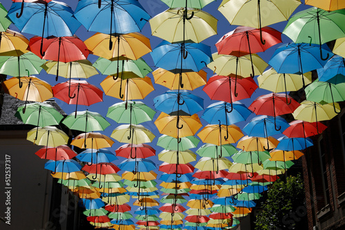 Umbrellas over a street in France