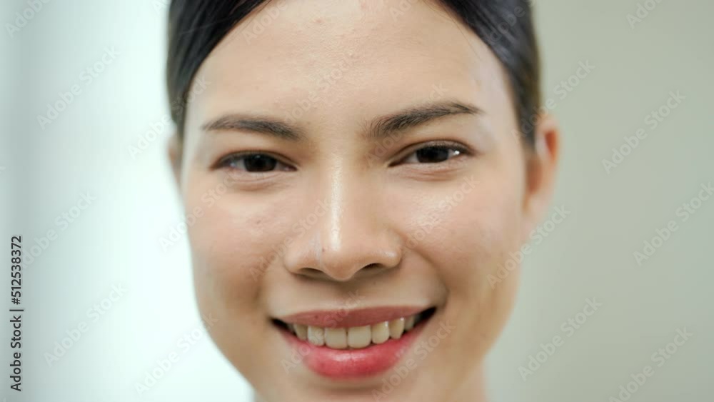 Portrait happy moment of young woman look at camera. Close up beautiful lady smiling slow motion shots. Portrait happy moment of young woman look at camera. Close up beautiful lady smiling slow motion shots.