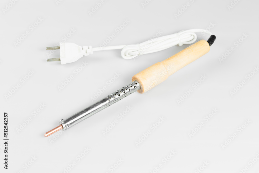 Electric soldering iron isolated on a white background Electric soldering iron isolated on a white background