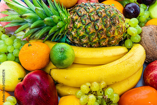 Fototapeta Naklejka Na Ścianę i Meble -  Assortment of healthy raw fruits. Composition With Variety Of Fruits