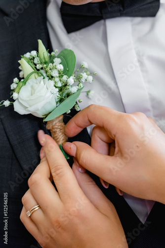bride and groom holding hands