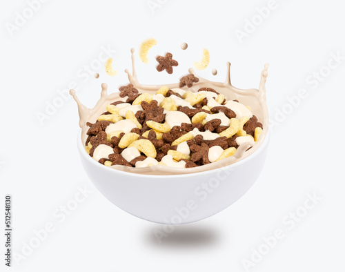 breakfast snacks fall into bowl with milk. File contains clipping path