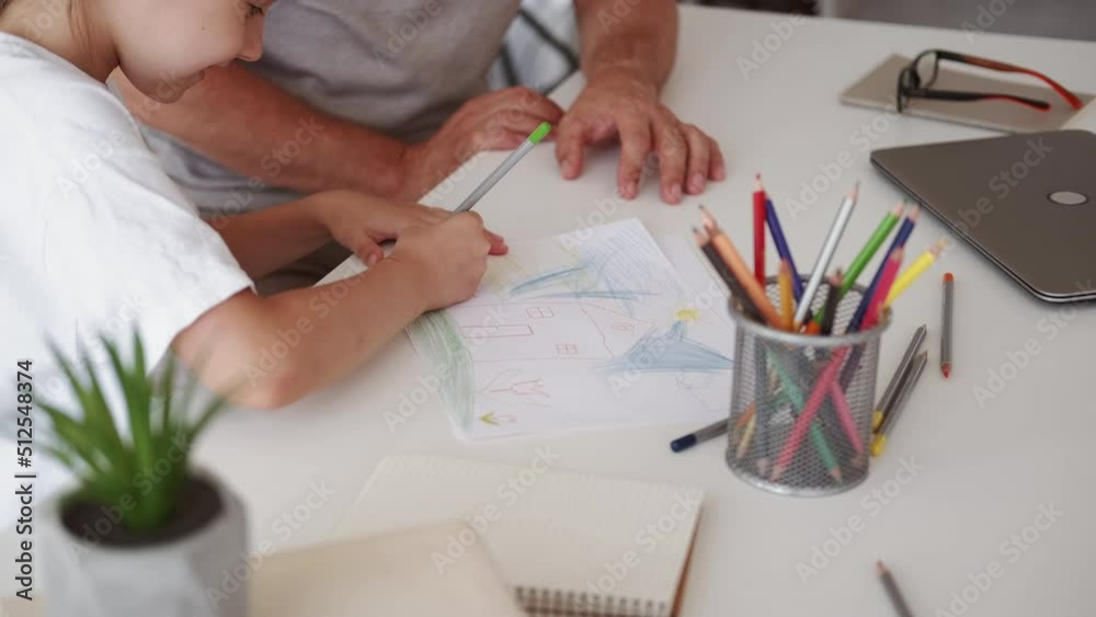Kid drawing. Family art leisure. Child talent imagination. Inspired little girl enjoying sketching with father painting home using color pencils. Kid drawing. Family art leisure. Child talent imagination. Inspired little girl enjoying sketching with father painting home using color pencils.