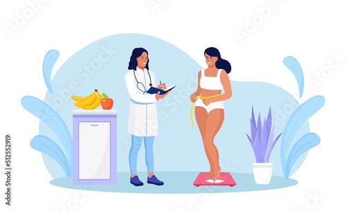 Girl standing on scales. Pretty young woman on diet trying to control body weight. Dietolog doctor make a diet plan for overweight and obese people for weight loss. Healthy Lifestyle, Dieting Concept