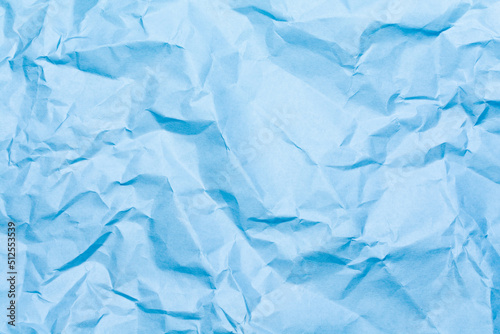 textured background of crumpled blue paper