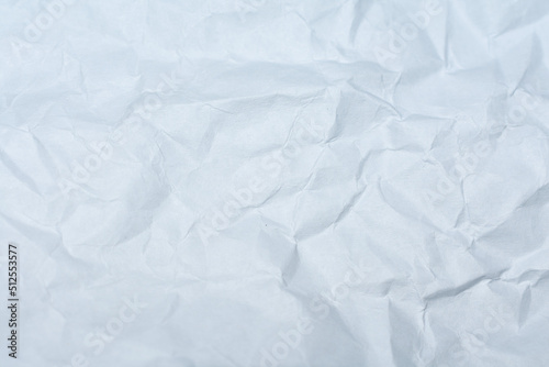 crumpled white paper textured background