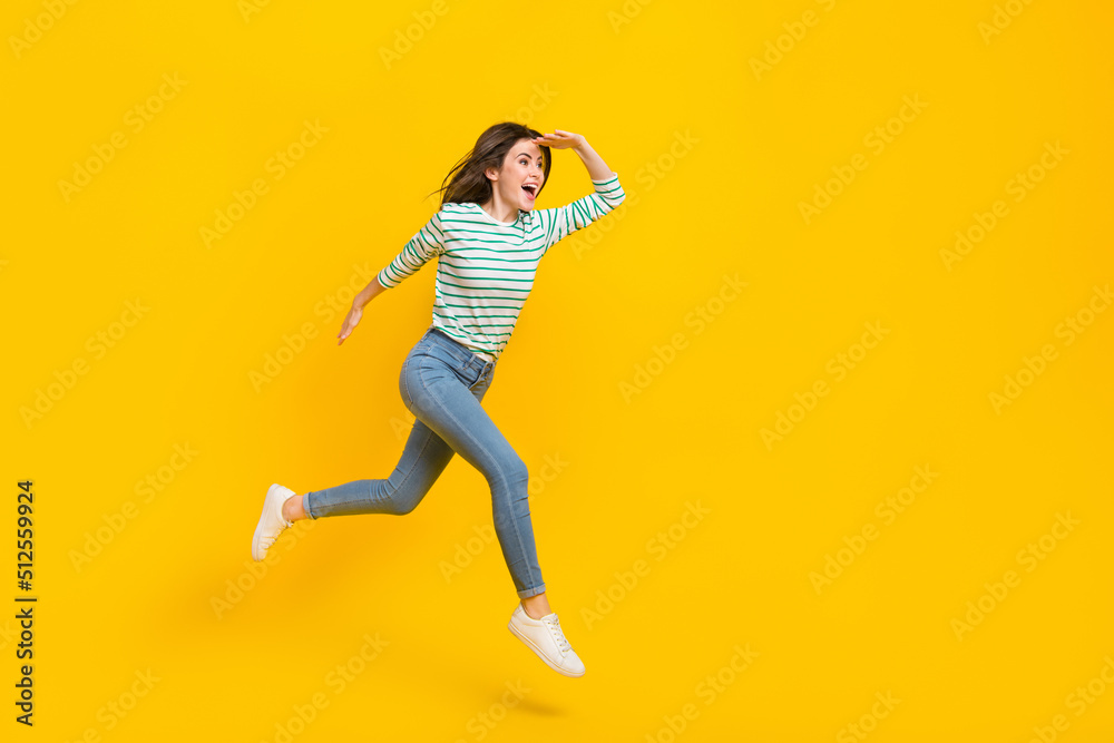 Full size profile side photo of traveling girl look empty space go on journey adventure isolated on yellow color background