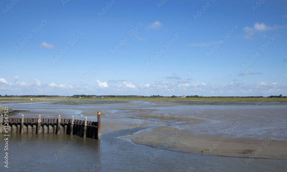 Low tide at Schiermonnikoog waddeneiland. Netherlands. Waddenzee. Coast Low tide at Schiermonnikoog waddeneiland. Netherlands. Waddenzee. Coast