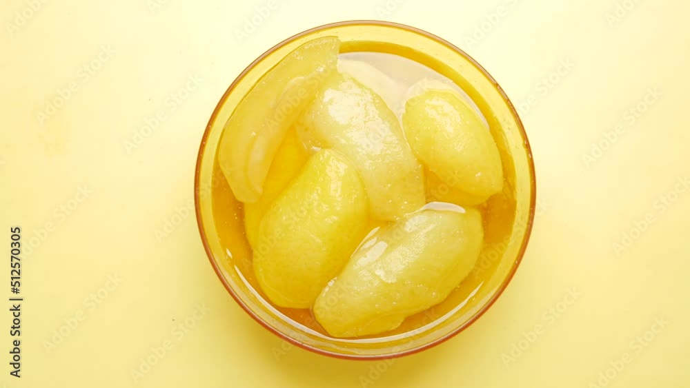 Homemade Mango Pickle in a glass jar on table , Homemade Mango Pickle in a glass jar on table ,