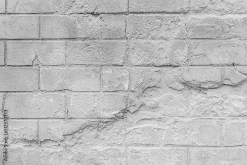 Old grey broken brickwork wall texture cement gray concrete background