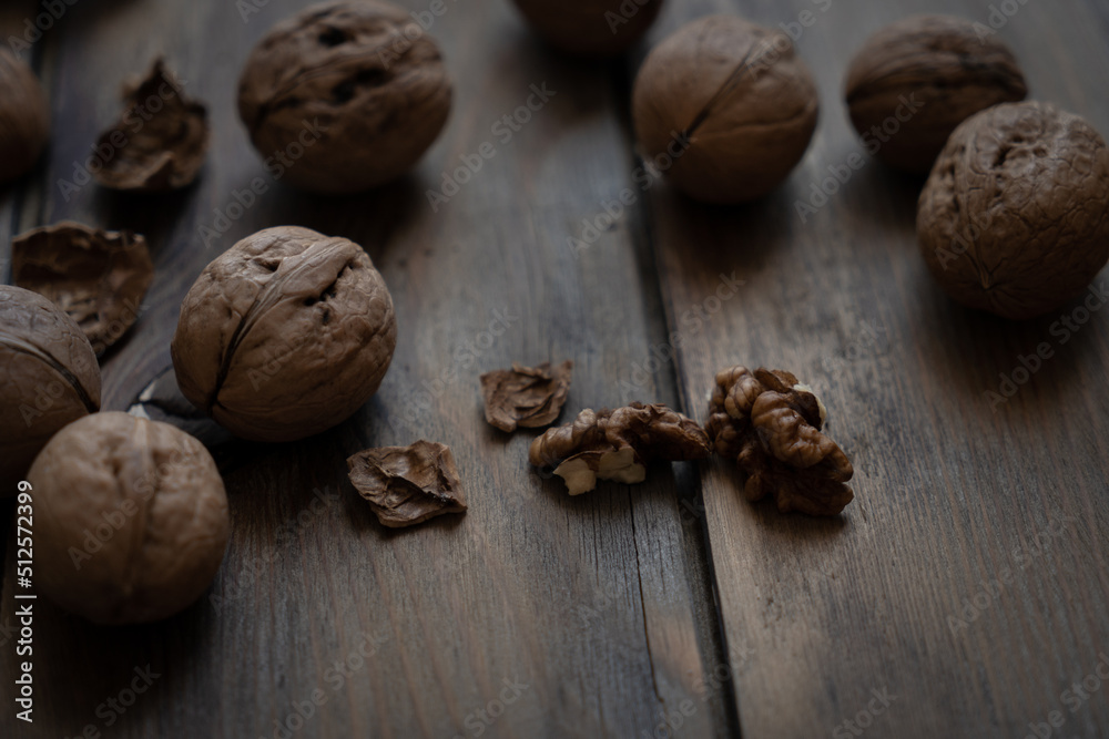 walnuts on wooden background walnuts on wooden background