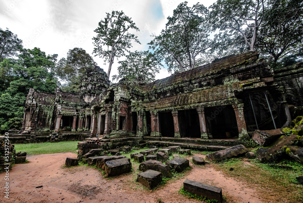 An ancient sandstone building that forms a walkway around the Ta Prohm temple at Angkor Wat. Siem Reap Cambodia An ancient sandstone building that forms a walkway around the Ta Prohm temple at Angkor Wat. Siem Reap Cambodia