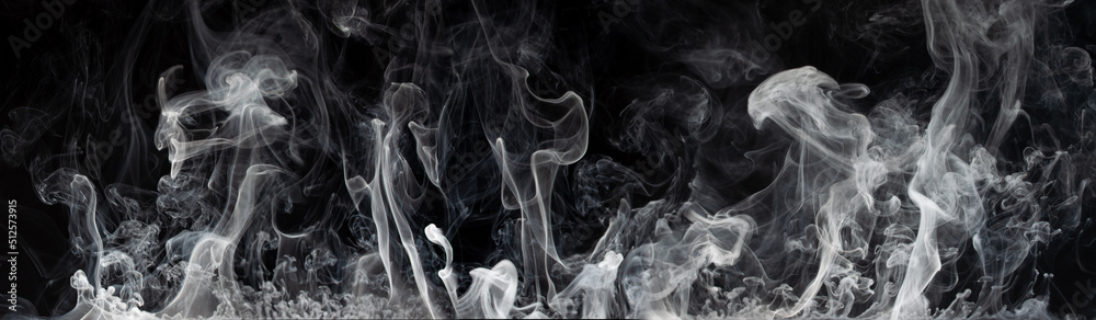 Fototapeta premium Abstract smoke on a dark background . Isolated .