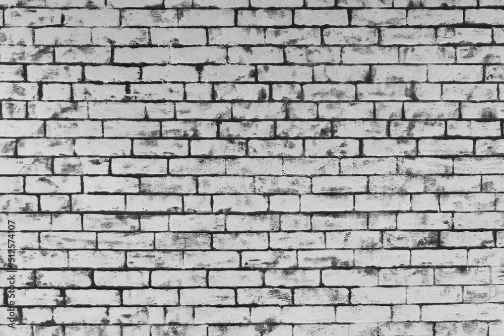 Fototapeta premium Grey brick wall of interior facade texture background architecture white