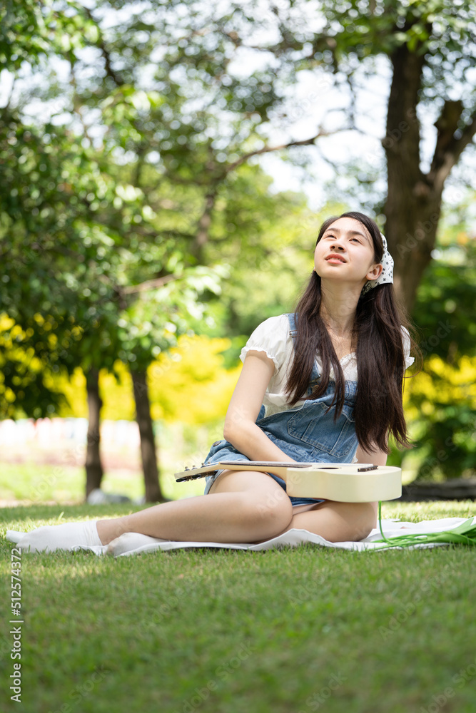 Photo portait smiling Girl in Green Park green city park in spring smiling dreamy, Smiling young brunette woman girl Photo portait smiling Girl in Green Park green city park in spring smiling dreamy, Smiling young brunette woman girl