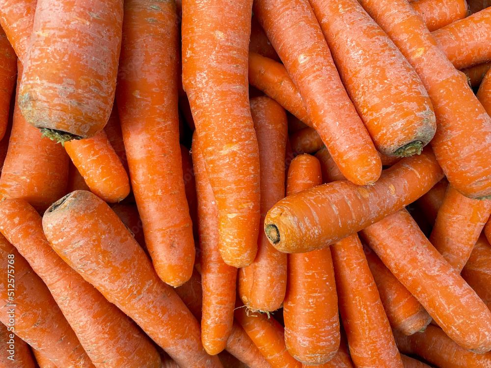 Fresh carrots on the market directly above view Fresh carrots on the market directly above view