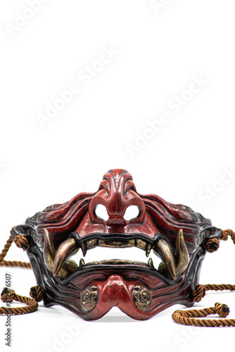 Isolated photos of a samurai mask in the form of a demon oni © Богдан Тарасов
