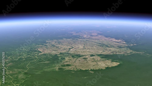 Deforestation of the Amazonia. View from space over the Amazon region. On a green background, huge bald patches of cut down forests are visible photo