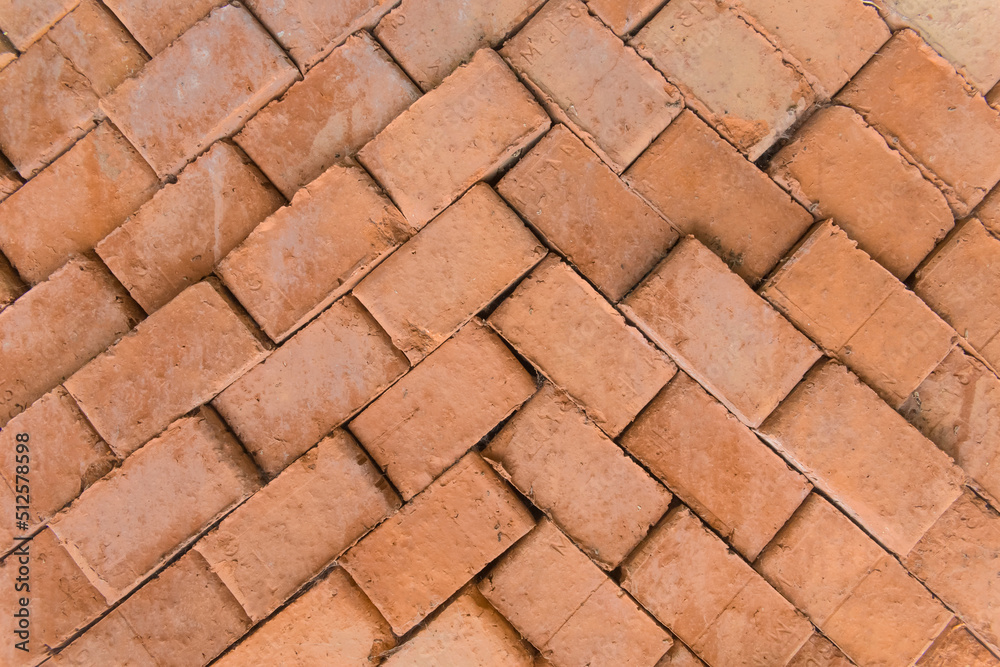 Brick red brown old packed building stack construction material masonry pattern texture background Brick red brown old packed building stack construction material masonry pattern texture background