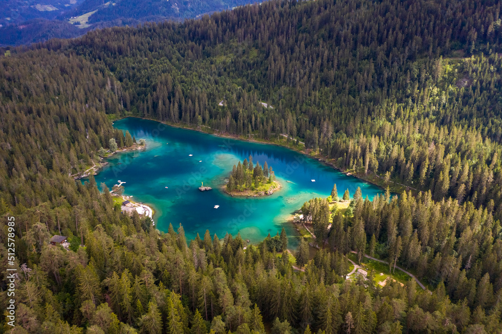 Aerial view of Caumer Lake in Graubrunden canton late afternoon, flims, Graubunden, Switzerland