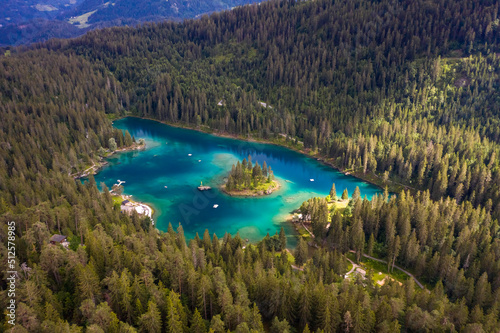 Aerial view of Caumer Lake in Graubrunden canton late afternoon, flims, Graubunden, Switzerland