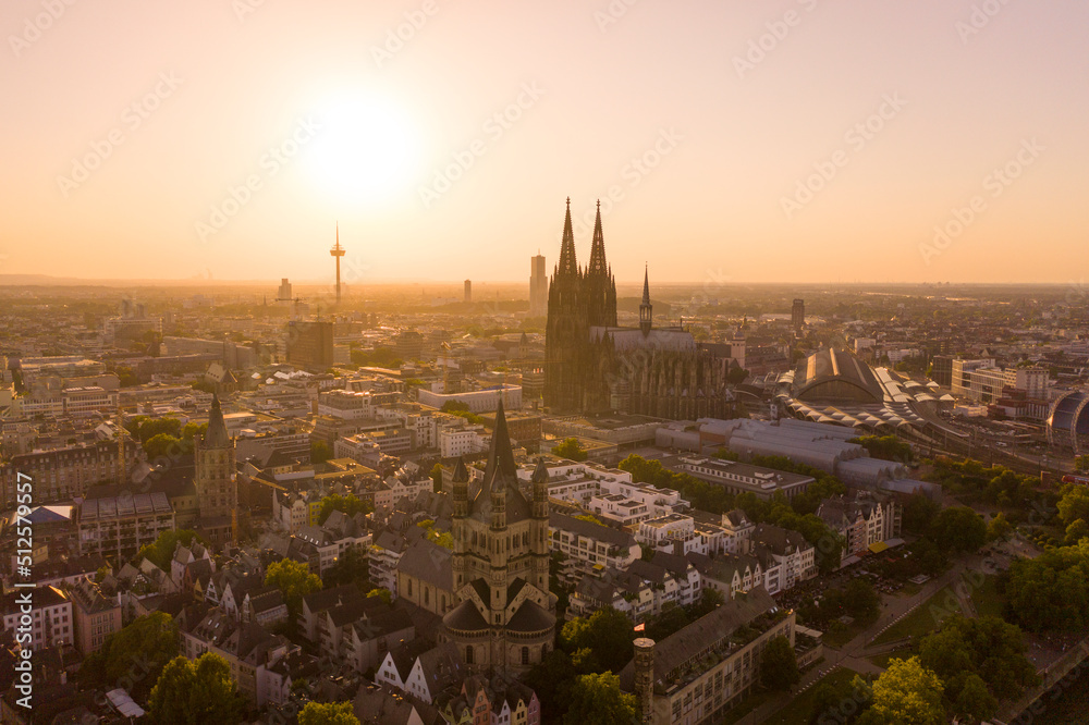 View of Cologne,  city center, the Rhine river and Cologne Cathedral by sunset